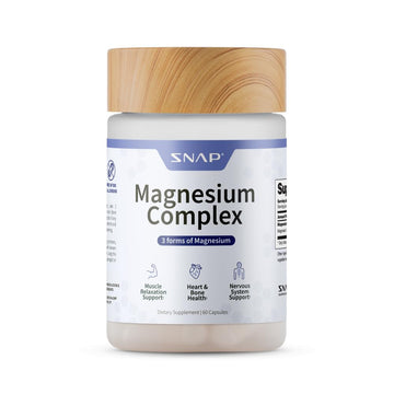 Supplement jar labeled 'Magnesium Complex' with a wooden cap on a white background
