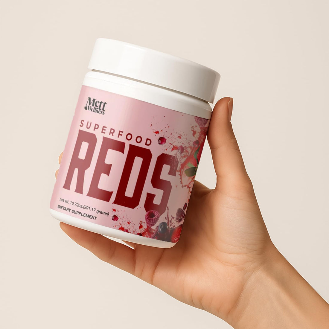 Supplement container labeled 'Superfood Reds' by Mett Wellness on a white background