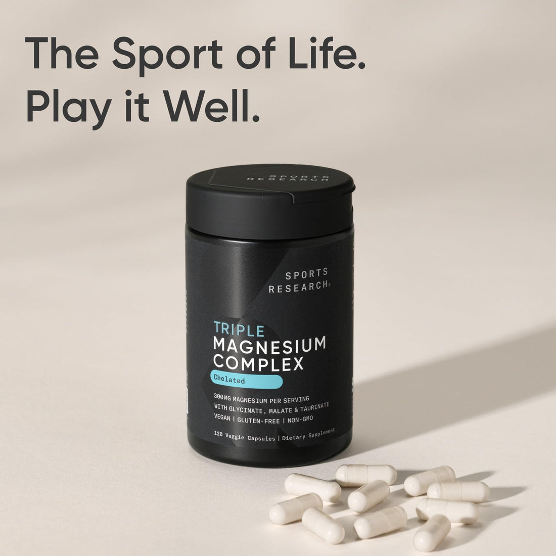 Black supplement container labeled 'Triple Magnesium Complex' by Sports Research on a white background.