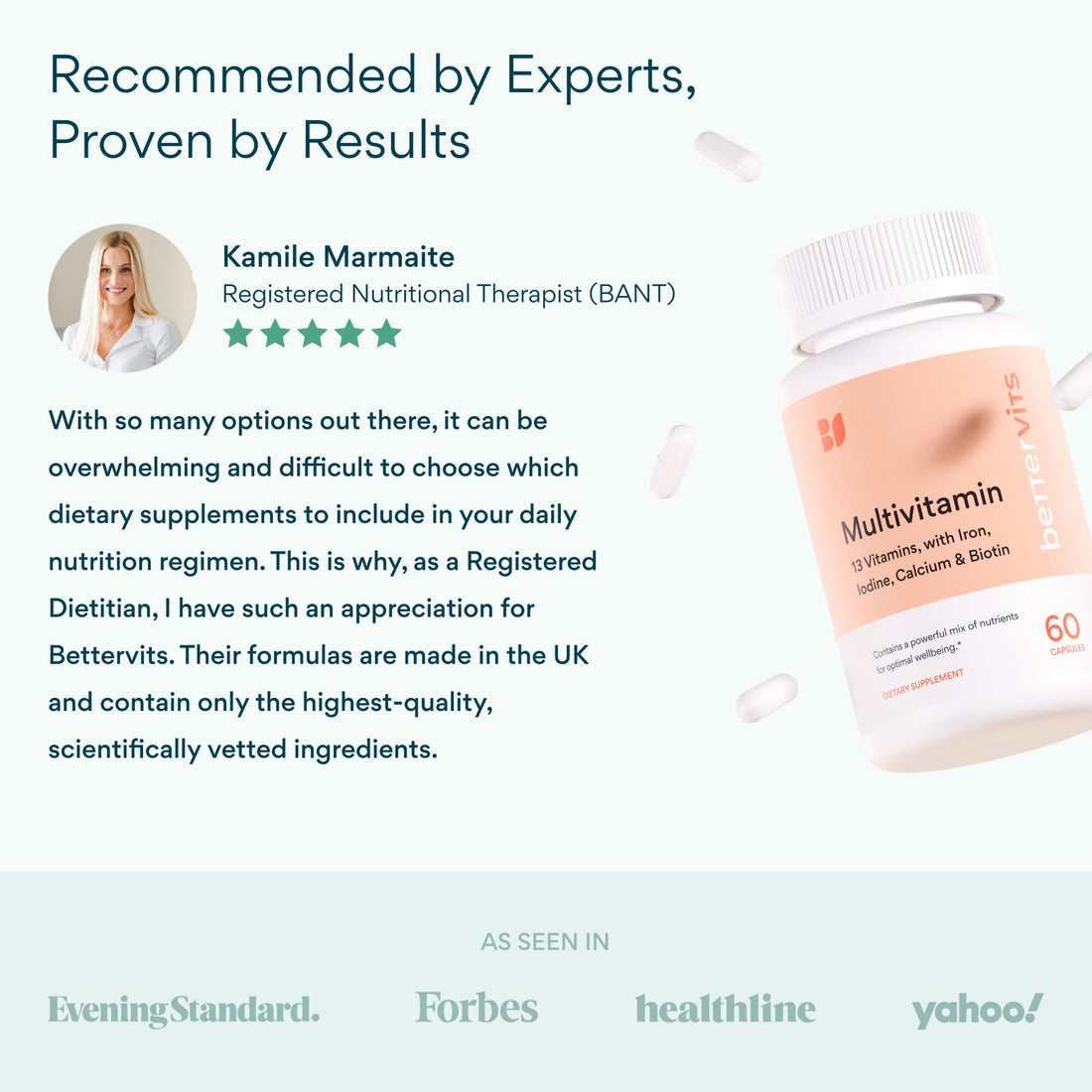 Multivitamin supplement bottle with white capsules on a light pink background