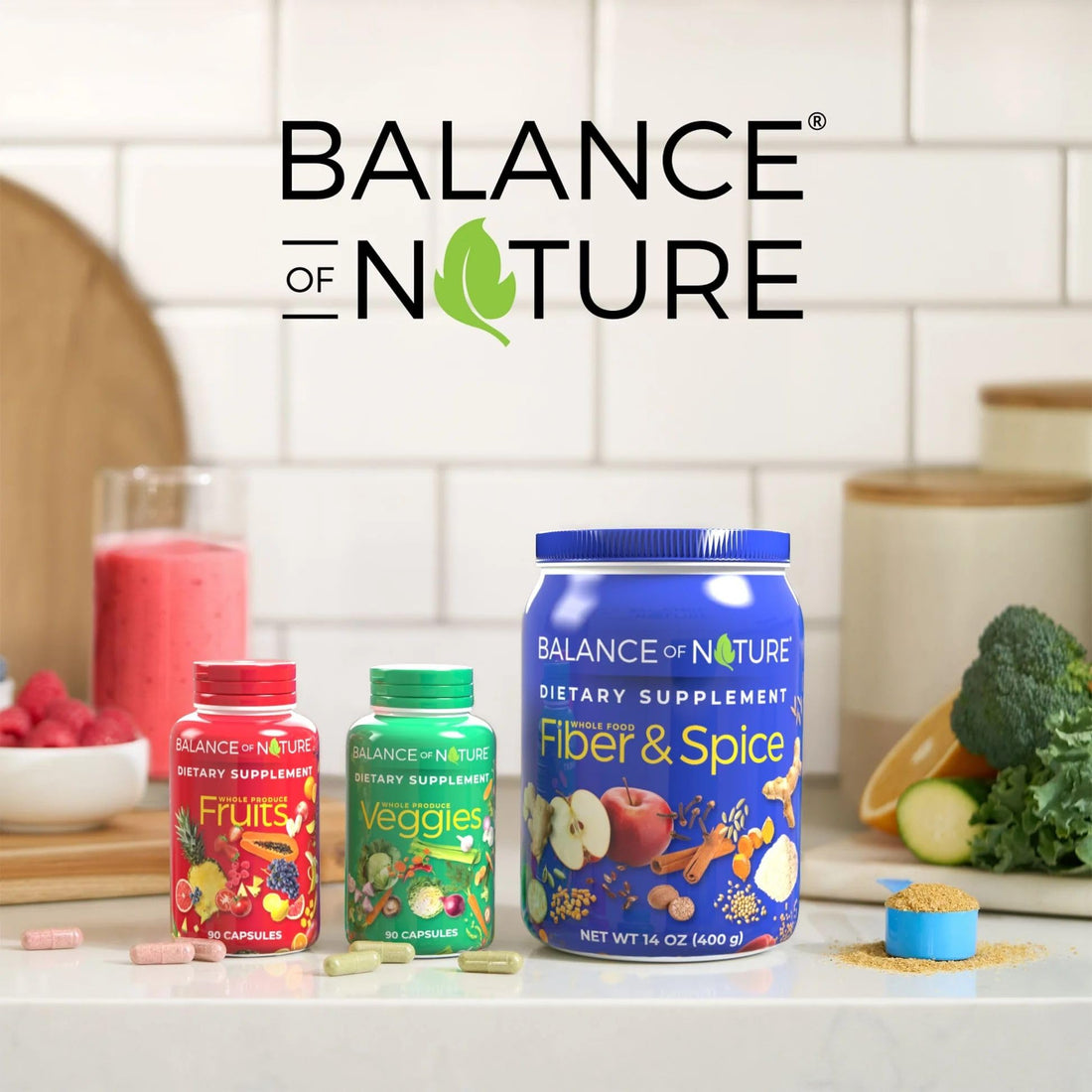 Red supplement bottle labeled 'Balance of Nature' with fruit illustrations on a white background
