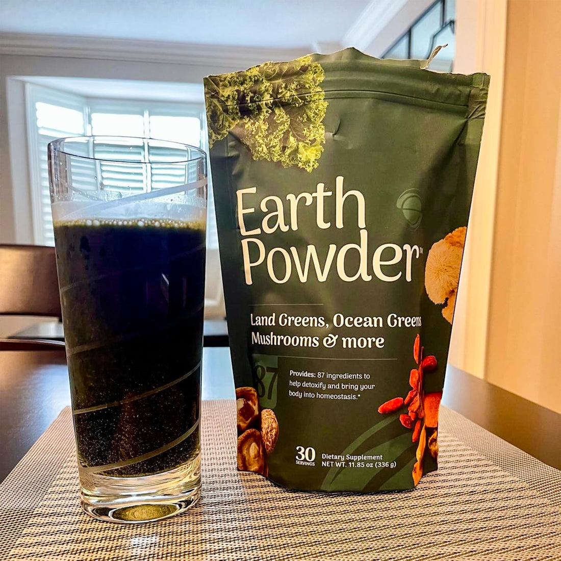 Earth Powder package with green color scheme and health benefits text